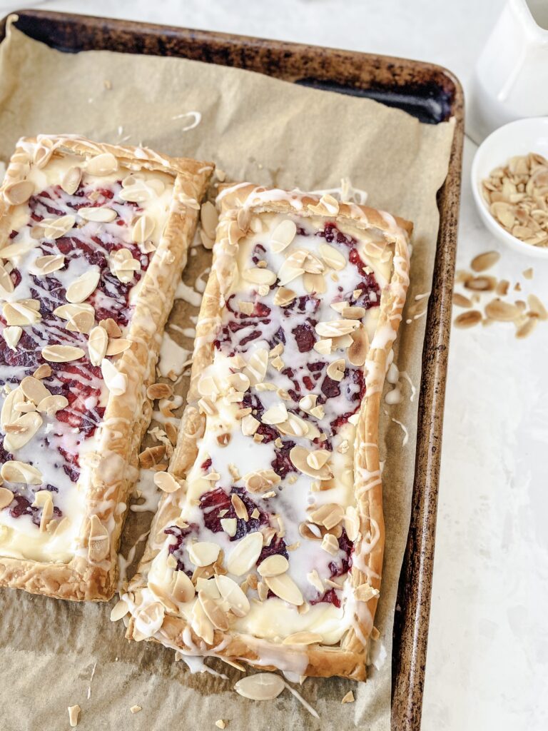 Shareable Puff Pastry Cranberry Almond Danish on a baking sheet.