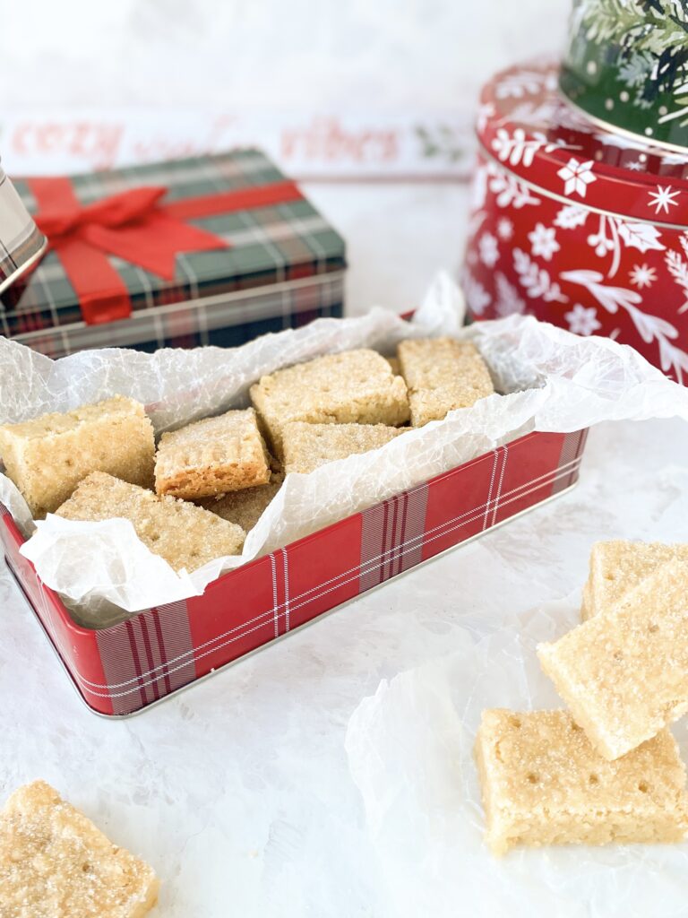 Scottish shortbread biscuits in a plaid cookie tin.