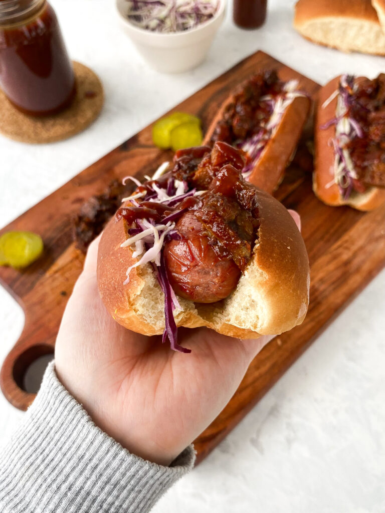 Kansas City Hot Dog loaded with brisket burnt ends, coleslaw, and sweet KC barbecue sauce.