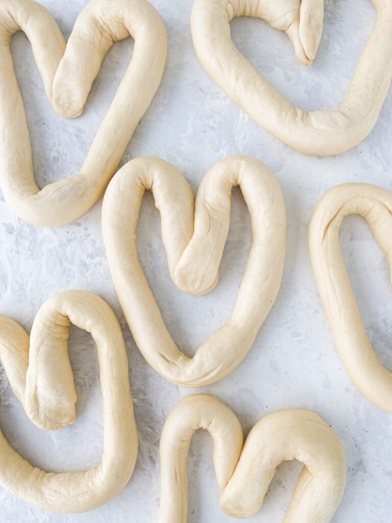 Pretzel dough shaped into hearts.