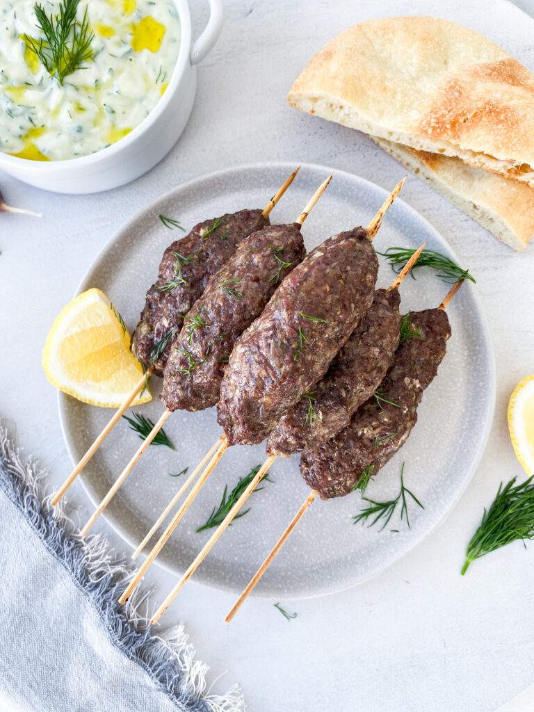 Greek beef kofta kebabs served with bright, fresh, garlicky tzatziki.