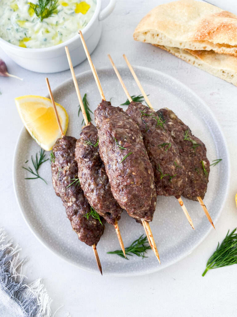 Greek beef kofta kebabs served with bright, fresh, garlicky tzatziki.