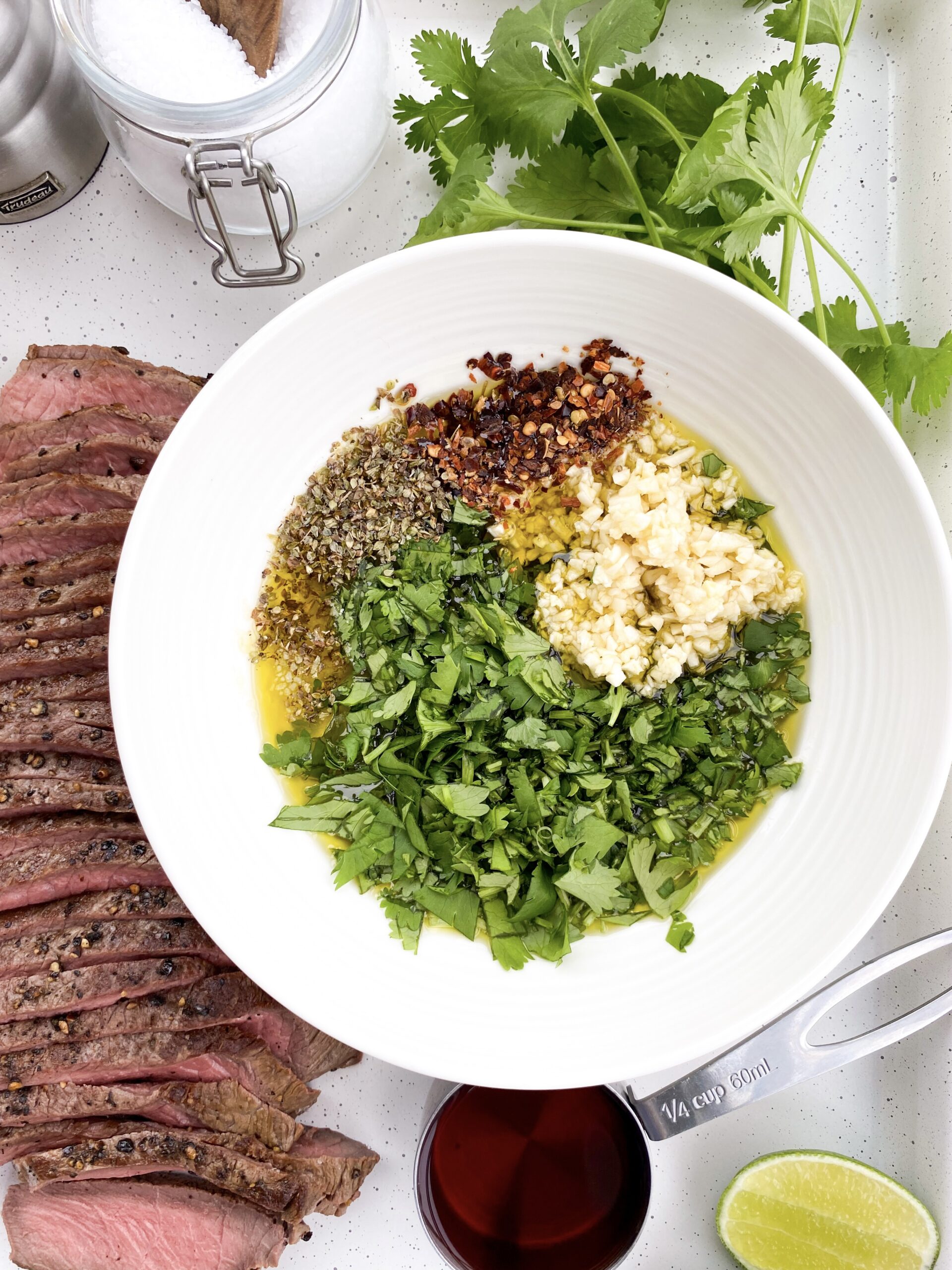 Add chimichurri sauce ingredients together in a bowl and whisk to combine.