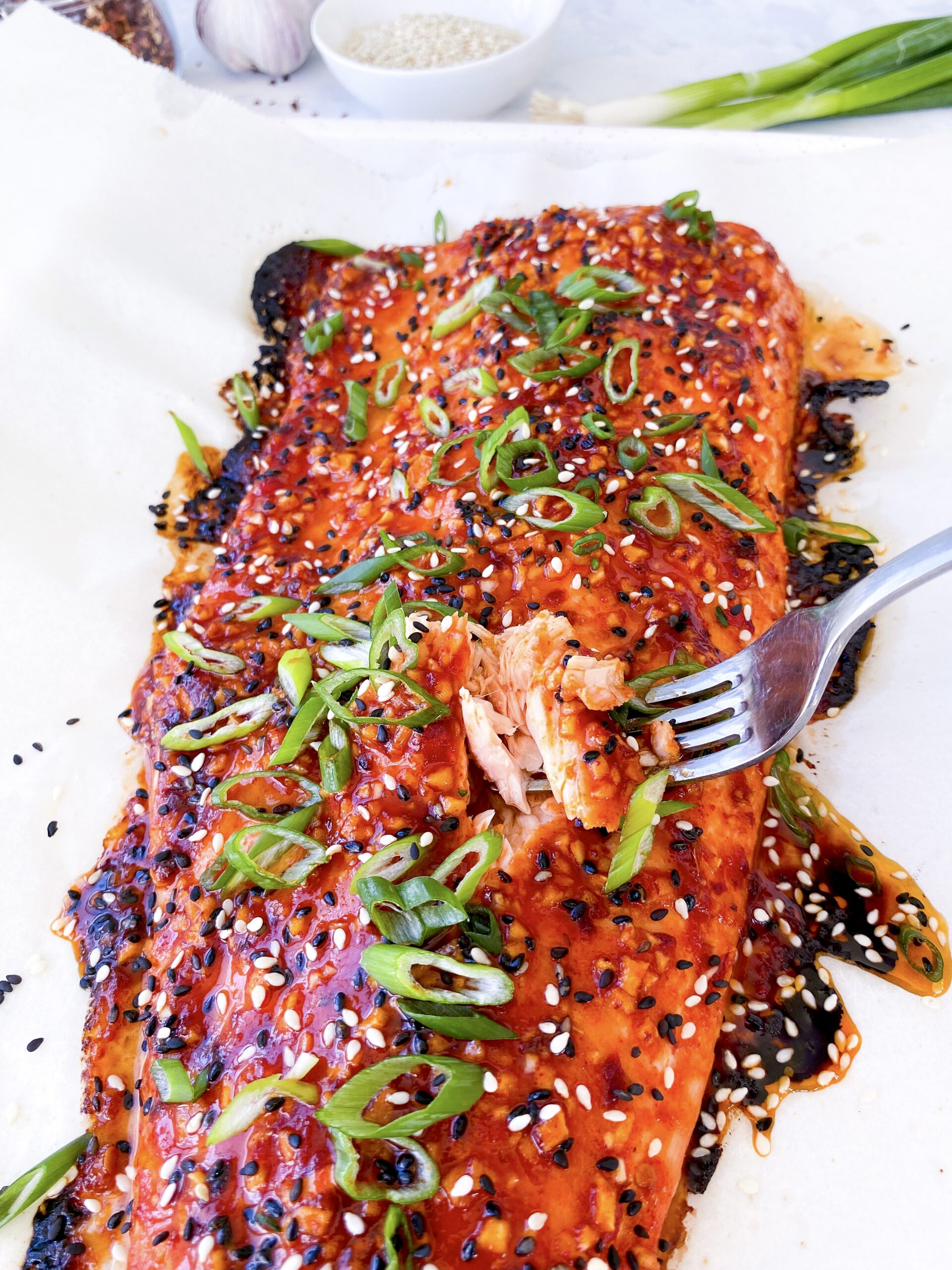Perfectly cooked, tender, pink salmon in spicy firecracker sauce.