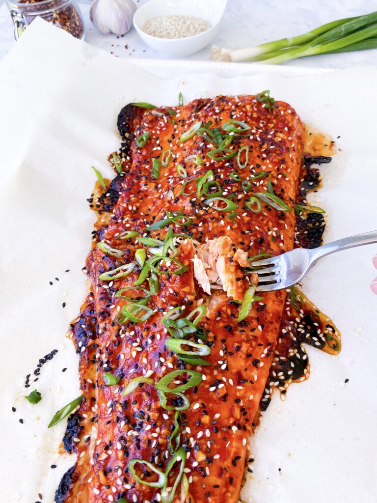 Tender Firecracker Salmon baked in fiery garlic chili sauce.