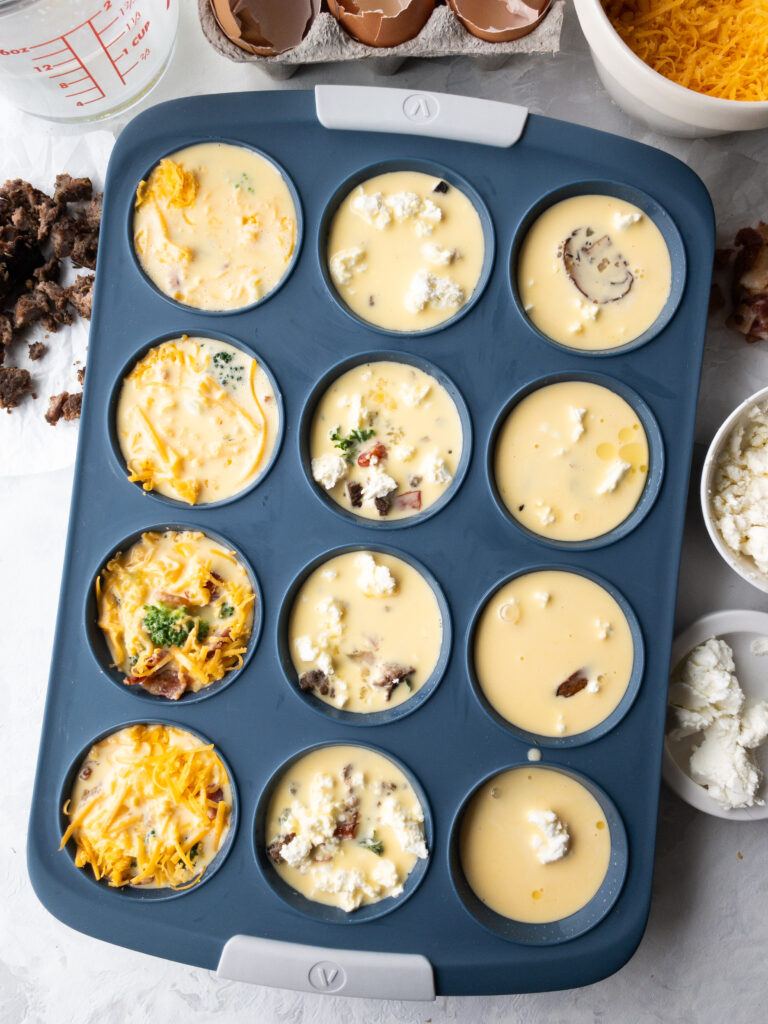 Homemade muffin tin egg bites, before baking.