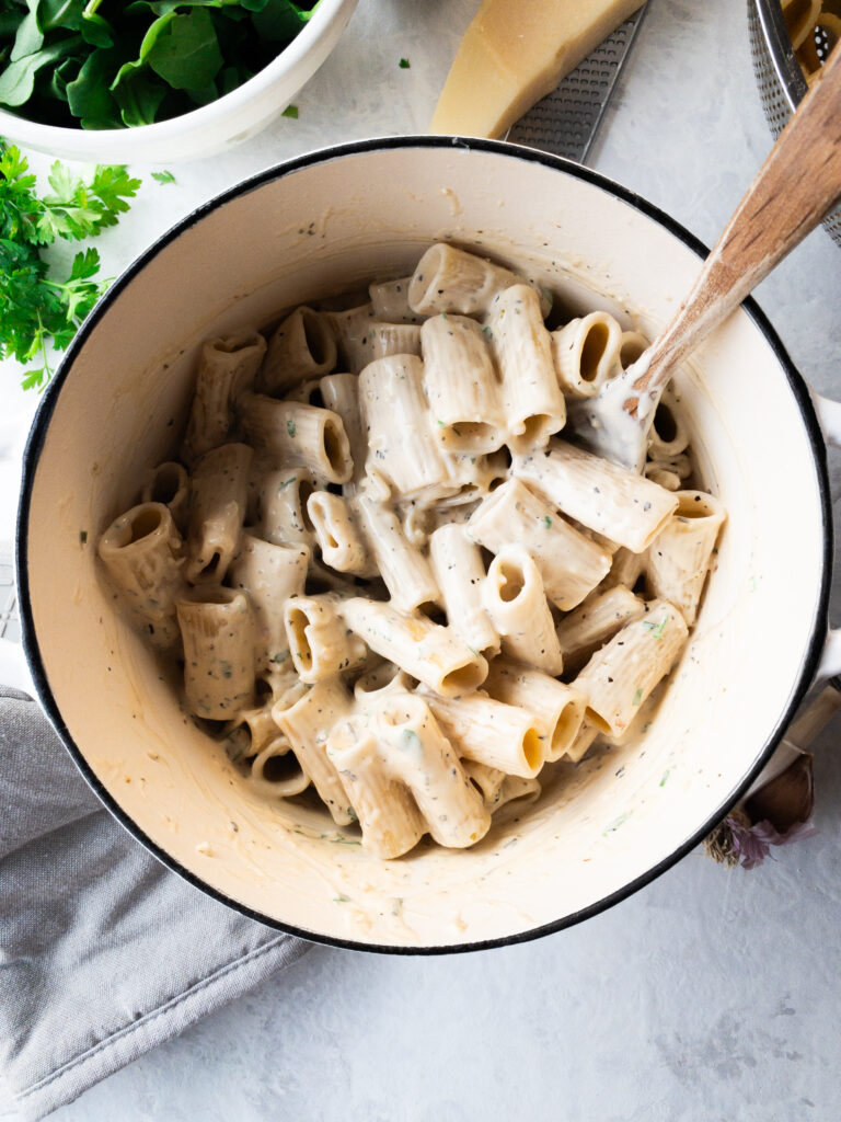Rigatoni pasta tossed in white cream sauce (pasta bianca).