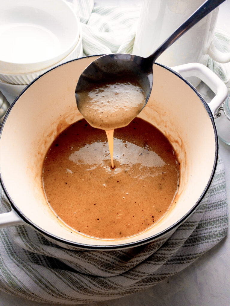 A spoonful of gluten-free and grain-free gravy thickened with the perfect ratio of xanthan gum.