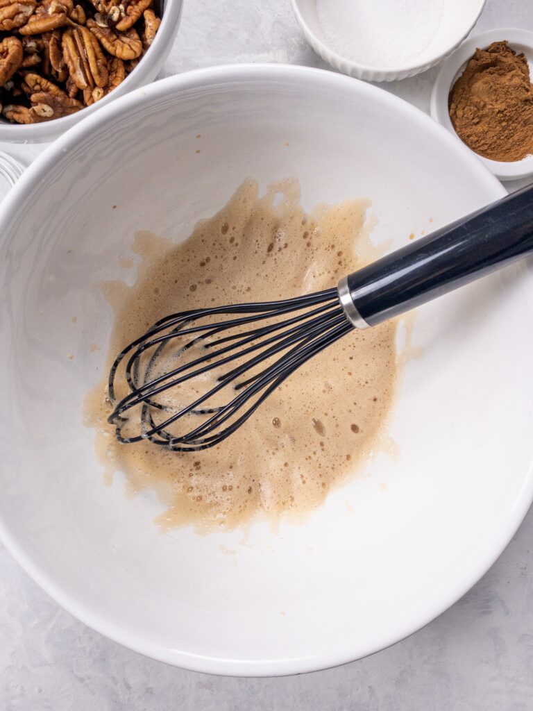 Egg whites whipped with vanilla and water until thick and frothy.