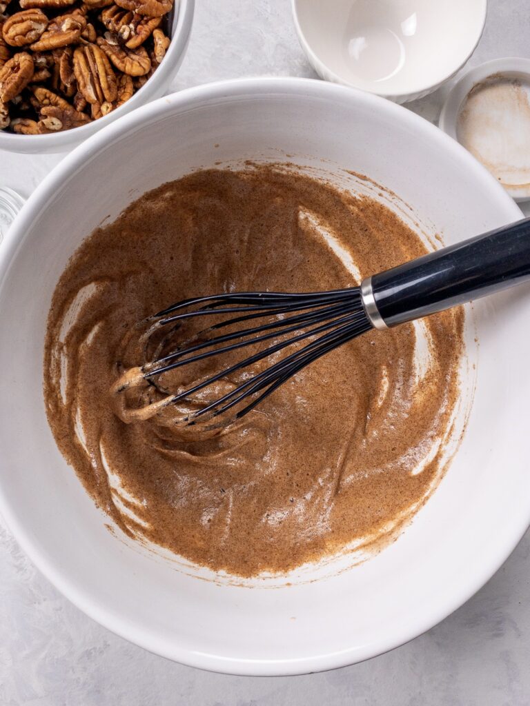 Egg whites whipped with water, vanilla, sugar, and spices creates a light, crisp coating for Candied Nuts.