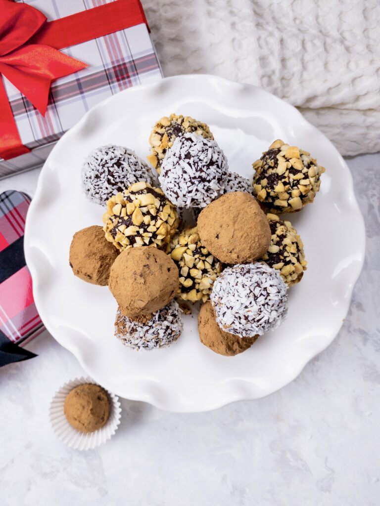 Keto Chocolate Truffles are an easy holiday dessert. Great for parties, gifting, and keeping in the freezer for last-minute hosting.
