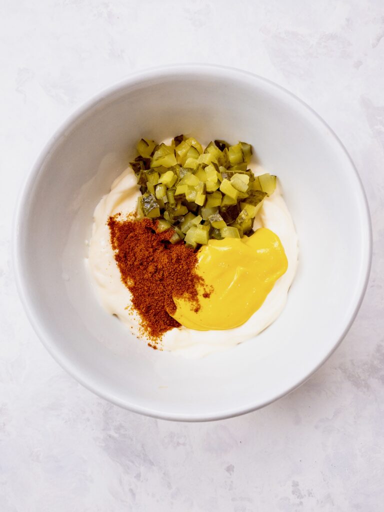 Ingredients for Big Mac sauce combined together in a bowl.