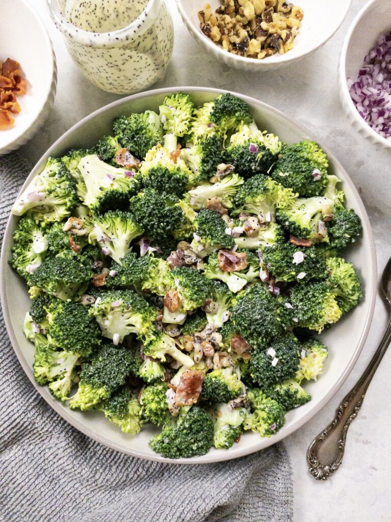 Broccoli Salad tossed in a simple, creamy poppy seed dressing.