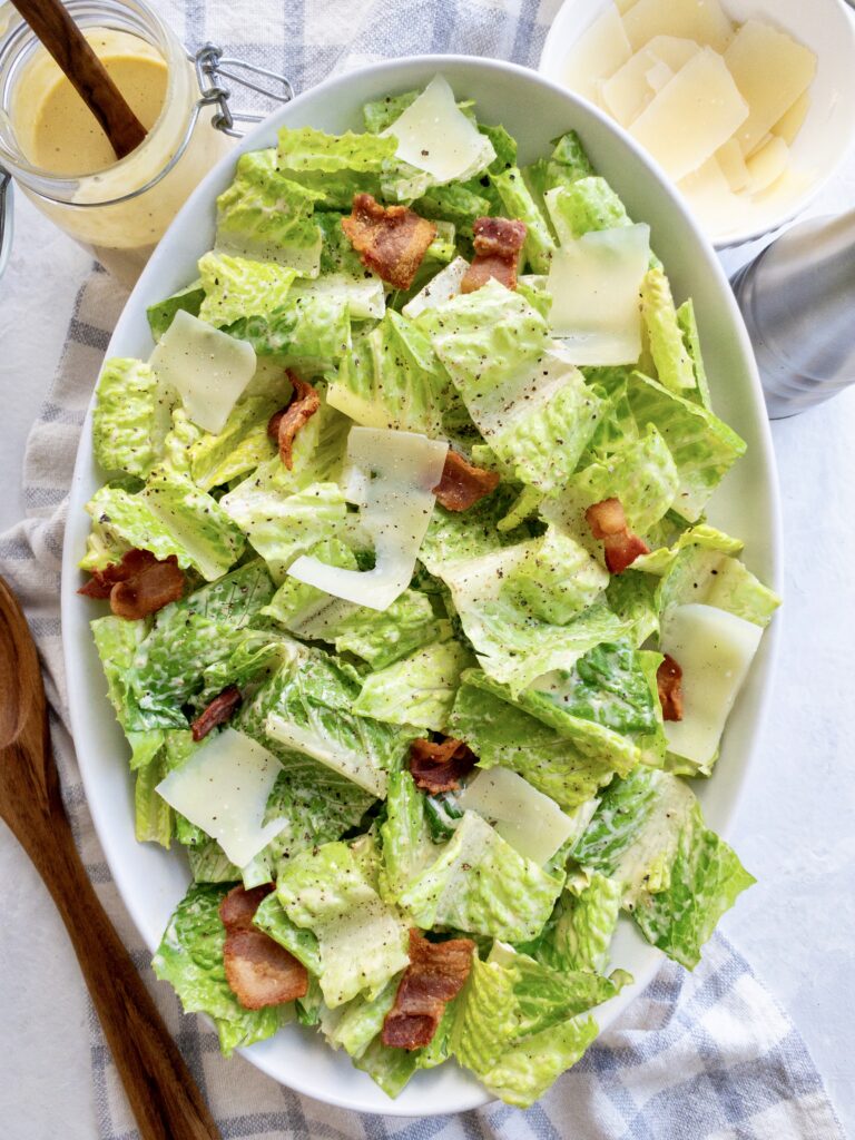 Keto Caesar Salad topped with homemade Caesar dressing, made without mayo or anchovies.