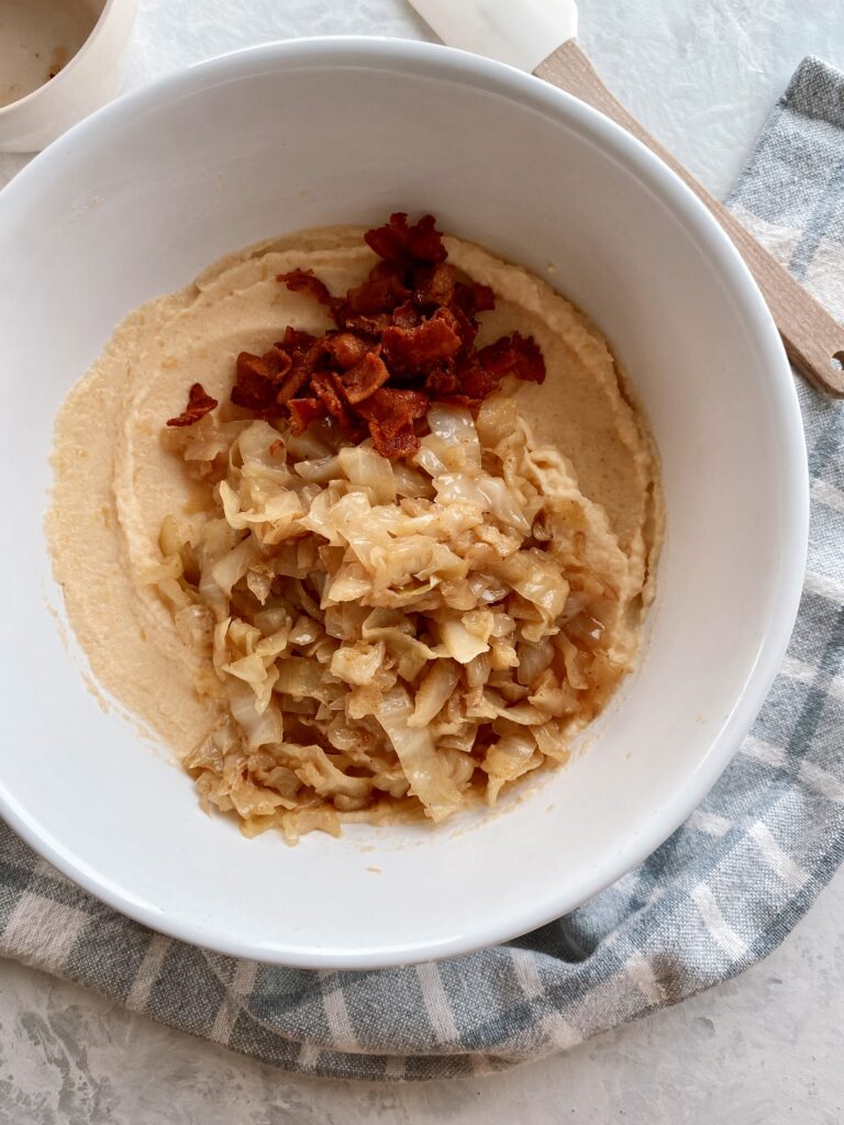 Crispy bacon and braised cabbage atop creamy mashed rutabaga.