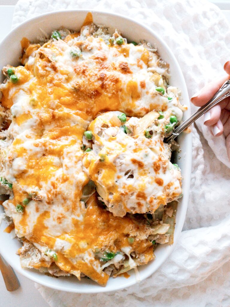 Keto Tuna Casserole made with canned tuna, cabbage 'noodles', sweet peas, and lots of melty cheese.