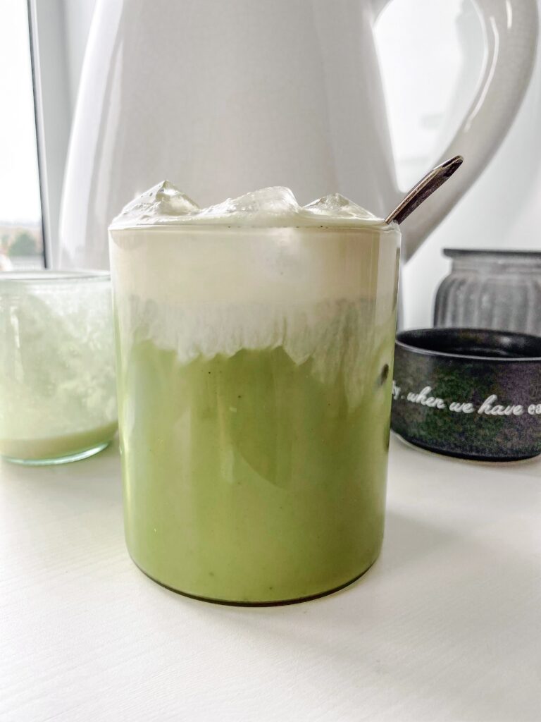 Iced Matcha Latte topped with homemade Copycat Starbucks Sweet Cream Cold Foam.